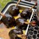 image of chicken lollipops on the smoker
